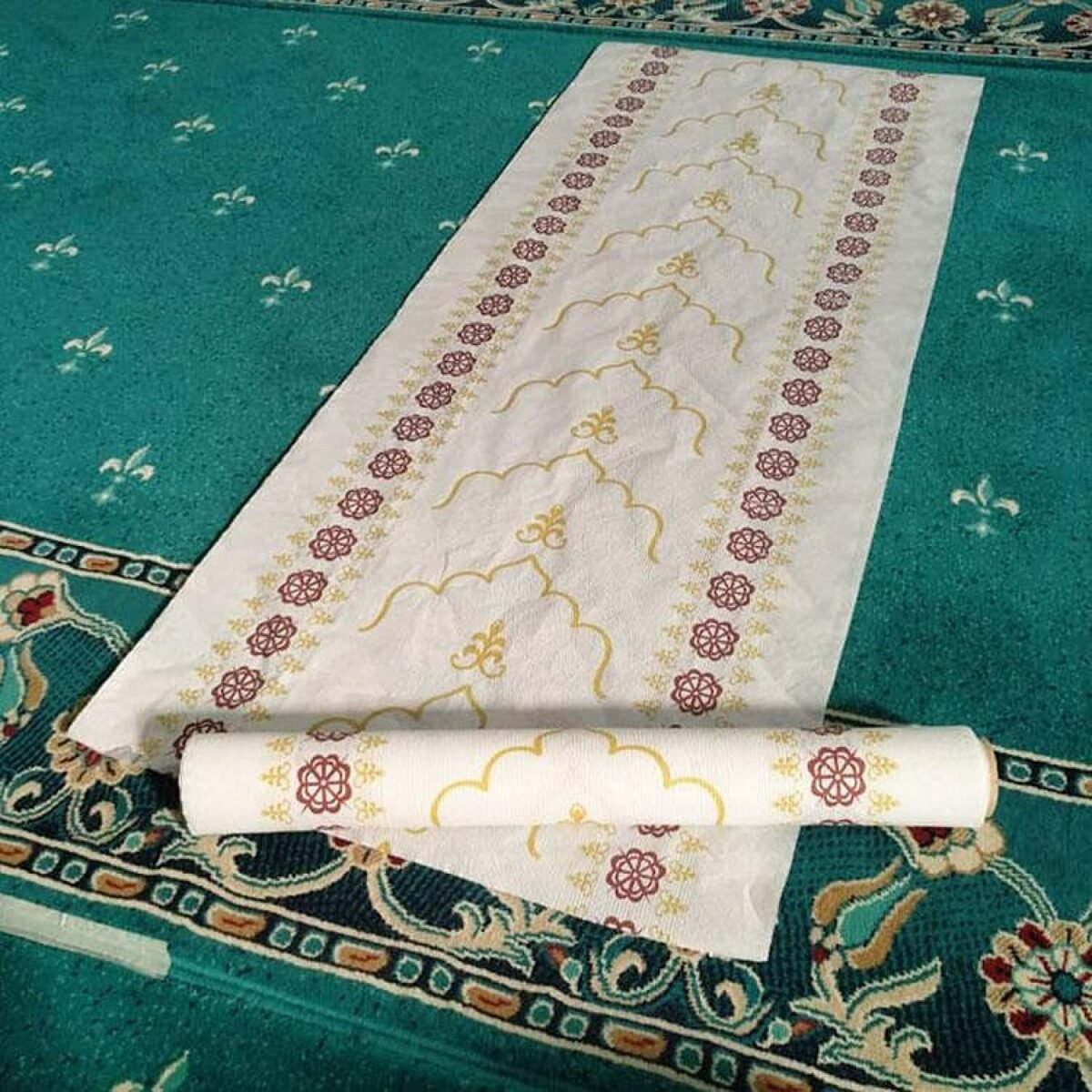 Disposable mats (rugs, Janamaz) Roll of 50 2 layers top thin paper , bottom thin plastic for mosques or individual - Image 2